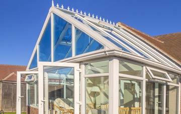 conservatory roof insulation costs Hunters Forstal